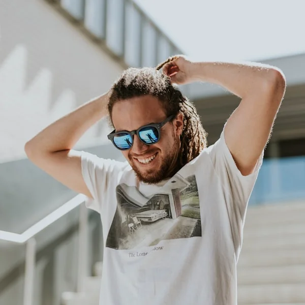 Smiling man wearing sunglasses