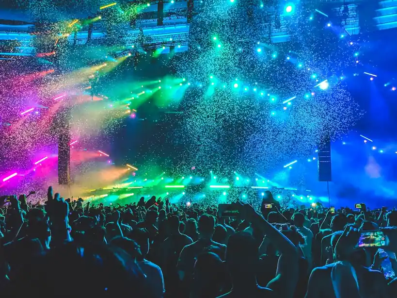 Live dance event under colourful stage lights